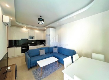 Стильная уютная двухкомнатная квартира с мебелью, 55м², в 450 метрах от моря, в комплексе с инфраструктурой, Махмутлар, Аланья ID-15774 фото-3