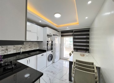 Stylish furnished three-bedroom penthouse, 145m², with separate kitchen, 300 m from the sea, Mahmutlar, Alanya ID-15775 фото-10