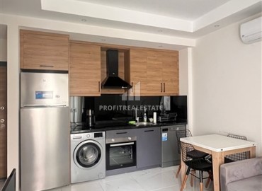 Cozy ergonomic one bedroom apartment with furniture, 50 m², in a residence with facilities, Oba, Alanya ID-15777 фото-4