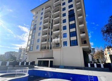One bedroom apartment at an attractive price, in a new building, unfurnished, 50m², 550 meters from the sea, Mahmutlar, Alanya ID-15781 фото-9