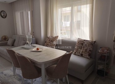 Furnished apartment 1+1, 60m², with a glazed balcony in a good-quality house near the Tuesday market in Mahmutlar ID-15784 фото-4