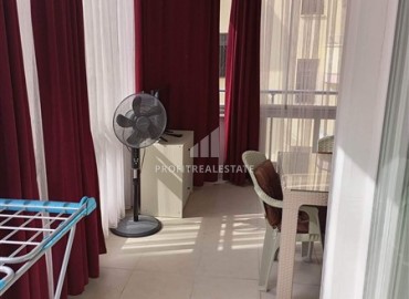 Furnished apartment 1+1, 60m², with a glazed balcony in a good-quality house near the Tuesday market in Mahmutlar ID-15784 фото-12