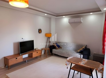 Меблированная квартира 1+1, 55м², в доме городского типа в Арпачбахшиш, в Эрдемли, в 350м от моря ID-15786 фото-2