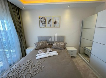 Фешенебельная квартира с одной спальней, 55м², в элитном комплексе в 300 метрах от моря в районе Кестель ID-15801 фото-11