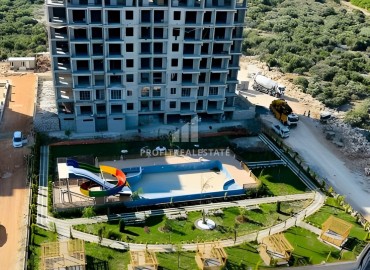Комфортабельные квартиры, 65-110м², в элитном комплексе у моря на этапе строительства в Аяш, Эрдемли ID-15802 фото-3
