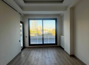 Трехкомнатная квартира, 100м², с отдельной кухней и огромной террасой в новостройке в Тедже, Мерсин ID-15803 фото-10