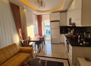 Cozy furnished one-bedroom apartment 55m², 450 meters from the sea, in a residence with facilities, Mahmutlar, Alanya ID-15810 фото-4