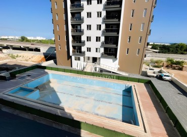 Apartment with two bedrooms and a separate kitchen, 115m², in a new building with a swimming pool in Kargıpınarı, Mersin ID-15816 фото-20