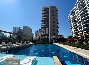 One bedroom apartment, 55m², in a new residence with facilities 600m from the sea in Erdemli, Arpacbakhsis ID-15820 фото-1