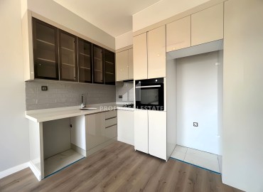 One bedroom apartment, 55m², in a new residence with facilities 600m from the sea in Erdemli, Arpacbakhsis ID-15820 фото-4