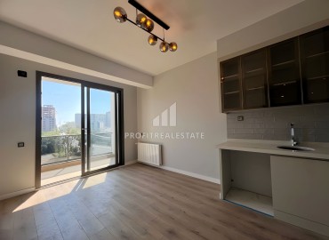 One bedroom apartment, 55m², in a new residence with facilities 600m from the sea in Erdemli, Arpacbakhsis ID-15820 фото-5
