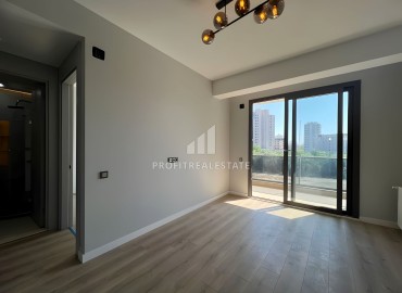 One bedroom apartment, 55m², in a new residence with facilities 600m from the sea in Erdemli, Arpacbakhsis ID-15820 фото-6
