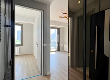 Двухкомнатные апартаменты, 55м², в новом комплексе с инфраструктурой в 600м от моря в Эрдемли, Арпачбахшиш ID-15820 фото-7