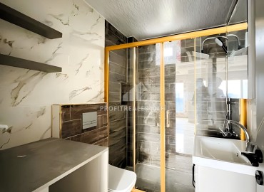 Квартира с одной спальней, 66м², с чистовой отделкой в малоквартирном комплексе в Эрдемли, Арпачбахшиш ID-15821 фото-11