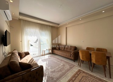 Уютная двухкомнатная квартира, 55м², с новой мебелью и бытовой техникой в Эрдемли, Арпачбахшиш ID-15824 фото-2