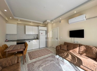 Уютная двухкомнатная квартира, 55м², с новой мебелью и бытовой техникой в Эрдемли, Арпачбахшиш ID-15824 фото-3