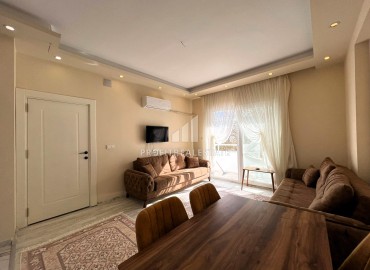 Уютная двухкомнатная квартира, 55м², с новой мебелью и бытовой техникой в Эрдемли, Арпачбахшиш ID-15824 фото-6