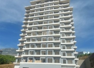 Inexpensive one bedroom apartment at the final stage of construction, in a new building with facilities, Mahmutlar, Alanya ID-15827 фото-1