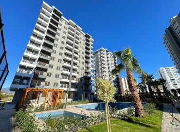 Nice apartment 1+1, 55m², in a comfortable residence with extensive facilities in the Tomyuk area, Mersin ID-15828 фото-1