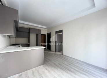 Симпатичная квартира 1+1, 55м², в комфортабельном комплексе с обширной инфраструктурой в районе Томюк, Мерсин ID-15828 фото-4