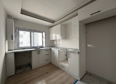 Апартаменты с одной спальней, 55м², в доме городского типа в Арпачбахшиш, в Эрдемли, в 350м от моря ID-15829 фото-6