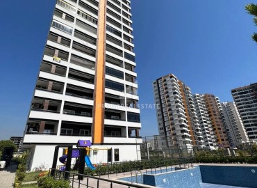 Двухкомнатные апартаменты, 65м², в новом комплексе с инфраструктурой в 300м от моря в Эрдемли, Арпачбахшиш ID-15830 фото-1