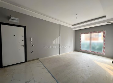 Двухкомнатные апартаменты, 65м², в новом комплексе с инфраструктурой в 300м от моря в Эрдемли, Арпачбахшиш ID-15830 фото-4