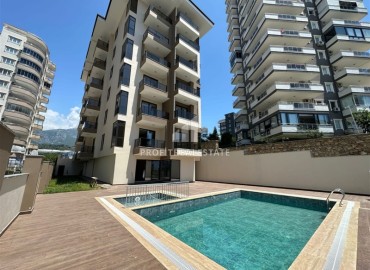 Modern one bedroom apartment, 55m². in a fresh house with facilities, in Mahmutlar area, Alanya ID-15835 фото-1