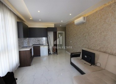 Современная квартира с одной спальней, 55м². в свежем доме с инфраструктурой, в районе Махмутлар, Аланья ID-15835 фото-3