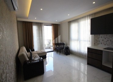 Modern one bedroom apartment, 55m². in a fresh house with facilities, in Mahmutlar area, Alanya ID-15835 фото-4