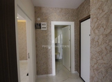 Современная квартира с одной спальней, 55м². в свежем доме с инфраструктурой, в районе Махмутлар, Аланья ID-15835 фото-6