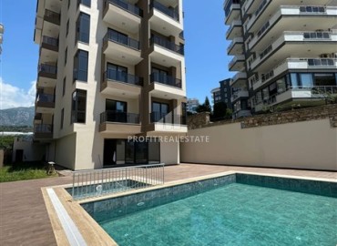Modern one bedroom apartment, 55m². in a fresh house with facilities, in Mahmutlar area, Alanya ID-15835 фото-18