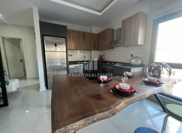 Stylish one bedroom apartment, 55 m², in a new building with an excellent location in the Alanya area - Mahmutlar ID-15837 фото-5