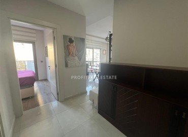 Stylish one bedroom apartment, 55 m², in a new building with an excellent location in the Alanya area - Mahmutlar ID-15837 фото-8
