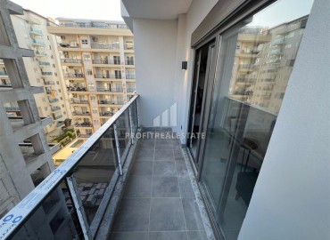 Stylish one bedroom apartment, 55 m², in a new building with an excellent location in the Alanya area - Mahmutlar ID-15837 фото-12