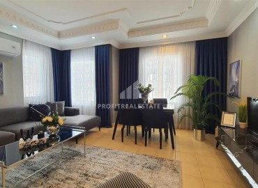 Two bedroom furnished apartment of 110 m², with a modern designer interior and sea views, in the center of Alanya ID-15867 фото-2