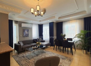 Two bedroom furnished apartment of 110 m², with a modern designer interior and sea views, in the center of Alanya ID-15867 фото-3