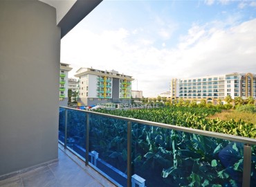Уютные двухкомнатные апартаменты, 55м², в новом комплексе с хорошей инфраструктурой, в 150м от моря в Каргыджаке, Алания ID-15871 фото-12