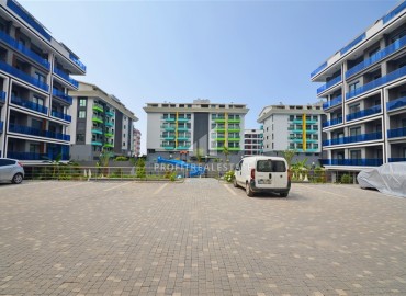 Уютные двухкомнатные апартаменты, 55м², в новом комплексе с хорошей инфраструктурой, в 150м от моря в Каргыджаке, Алания ID-15871 фото-13