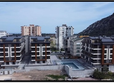 Linear and two-level apartment 92-185m², with glazed balconies and gas heating, Sarisu, Antalya ID-15874 фото-7