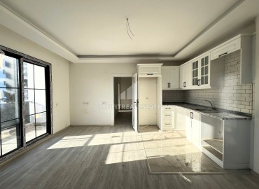 Don&#39;t miss the chance: one-bedroom apartment, 55m² in Erdemli, Alata district, at an attractive price ID-15875 фото-2