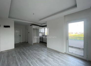 New one bedroom apartment, 50 m², in an urban house in Erdemli at an attractive price ID-15880 фото-2