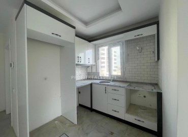 New one bedroom apartment, 50 m², in an urban house in Erdemli at an attractive price ID-15880 фото-3