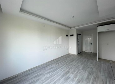 New one bedroom apartment, 50 m², in an urban house in Erdemli at an attractive price ID-15880 фото-4