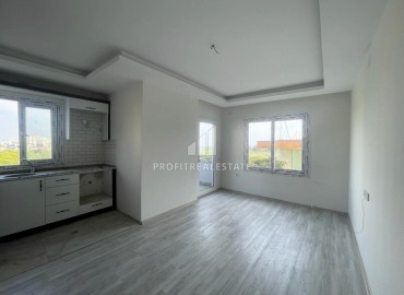 New one bedroom apartment, 50 m², in an urban house in Erdemli at an attractive price ID-15880 фото-5