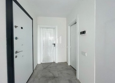 New one bedroom apartment, 50 m², in an urban house in Erdemli at an attractive price ID-15880 фото-7