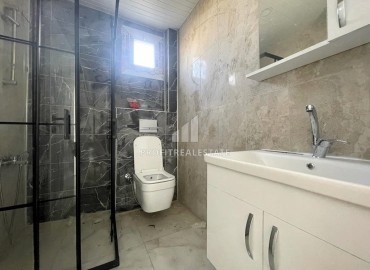 New one bedroom apartment, 50 m², in an urban house in Erdemli at an attractive price ID-15880 фото-12