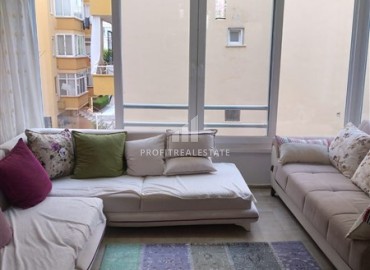 Small apartment with two bedrooms, 70m², 200m from the sea on the main street of Mahmutlar, Alanya ID-15884 фото-3