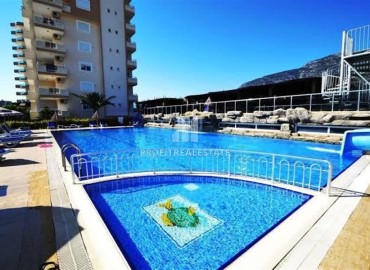 Bargain! Inexpensive two bedroom apartment with furniture, in a residence with facilities by the sea, Mahmutlar, Alanya ID-15887 фото-14