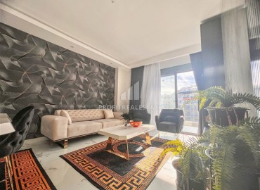 Новая квартира с одной спальней, 50м², в комфортабельном комплексе, в 550м от моря в районе Тосмур, Алания ID-15895 фото-4